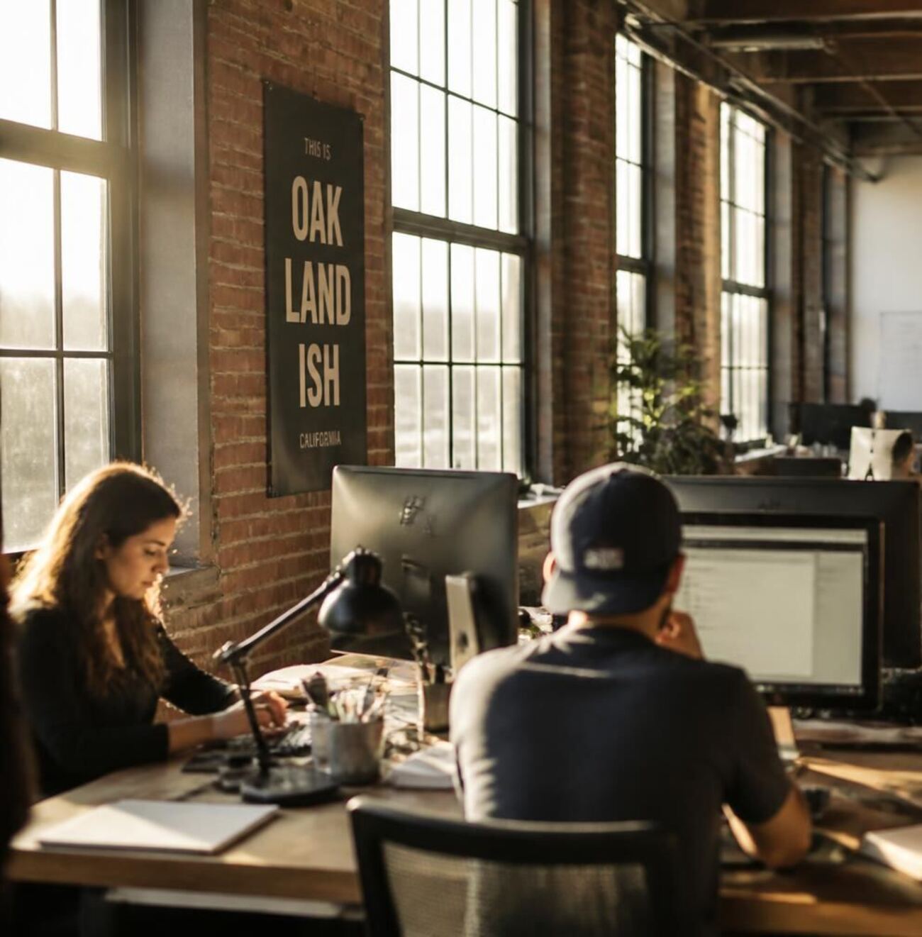 The Rayfield Advertising Group studio in a brick loft in West Oakland, California